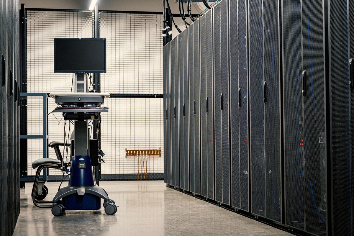 Racks of network servers and cabling in a data centre